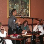 Panelist Sgt. Danny Camargo (standing), Seminole County Sheriff’s Office, addresses luncheon guests