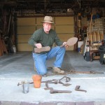 Jim Richardson shows collection of old tools from the harvesting of turpentine.