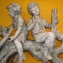 Statue of children at play. It stands in the lobby of Community Based Care service center (photo - CMF Public Media)