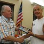 George Viele (right) purchases book from author and historian Ed L’Heureux (photo - CMF Public Media)