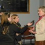 At right, panel member Debbra Groseclose interviewed by local media (photo - Charles E. Miller for CMF Public Media)