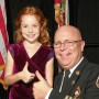From left - 6 year old Cecelia Gutman and Fire Chief Jim White (photo - Charles E. Miller for CMF Public Media)